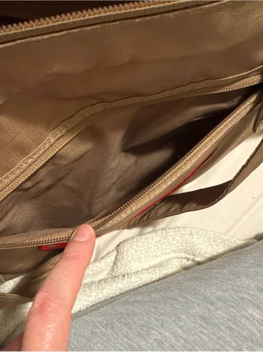 Nike Tan Duffel Bag with Red Swoosh